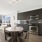 kitchen open to dining area and laundry niche