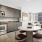 a kitchen with large windows