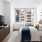 spacious bedroom with floor-to-ceiling windows