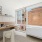 home office den with floor to ceiling windows