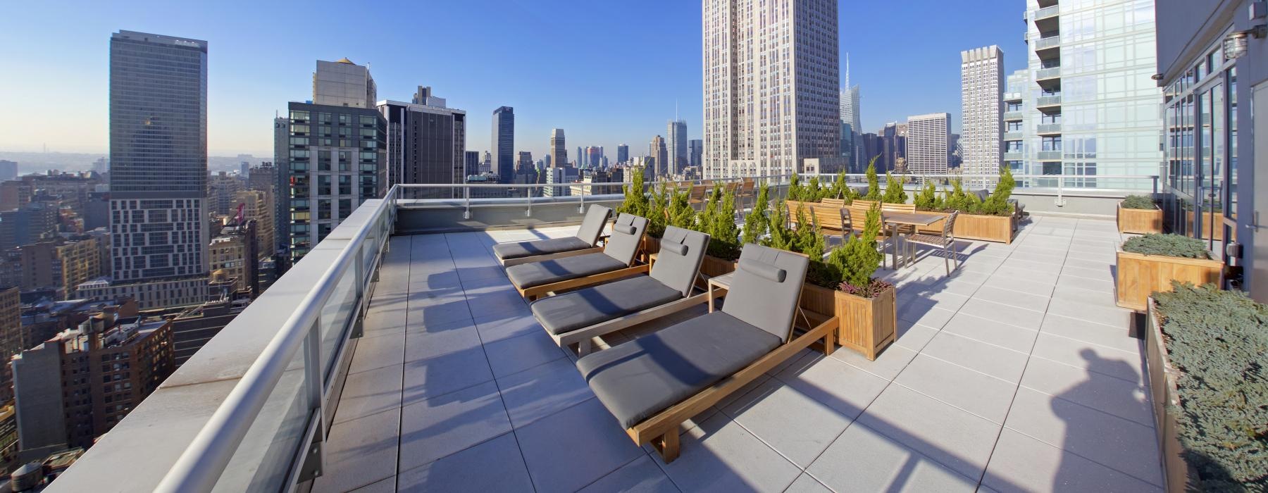 lounge chairs on rooftop terrace